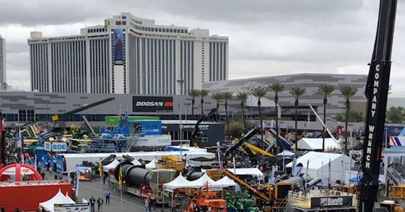 Users inside testing crane CONEXPO in Las Vegas